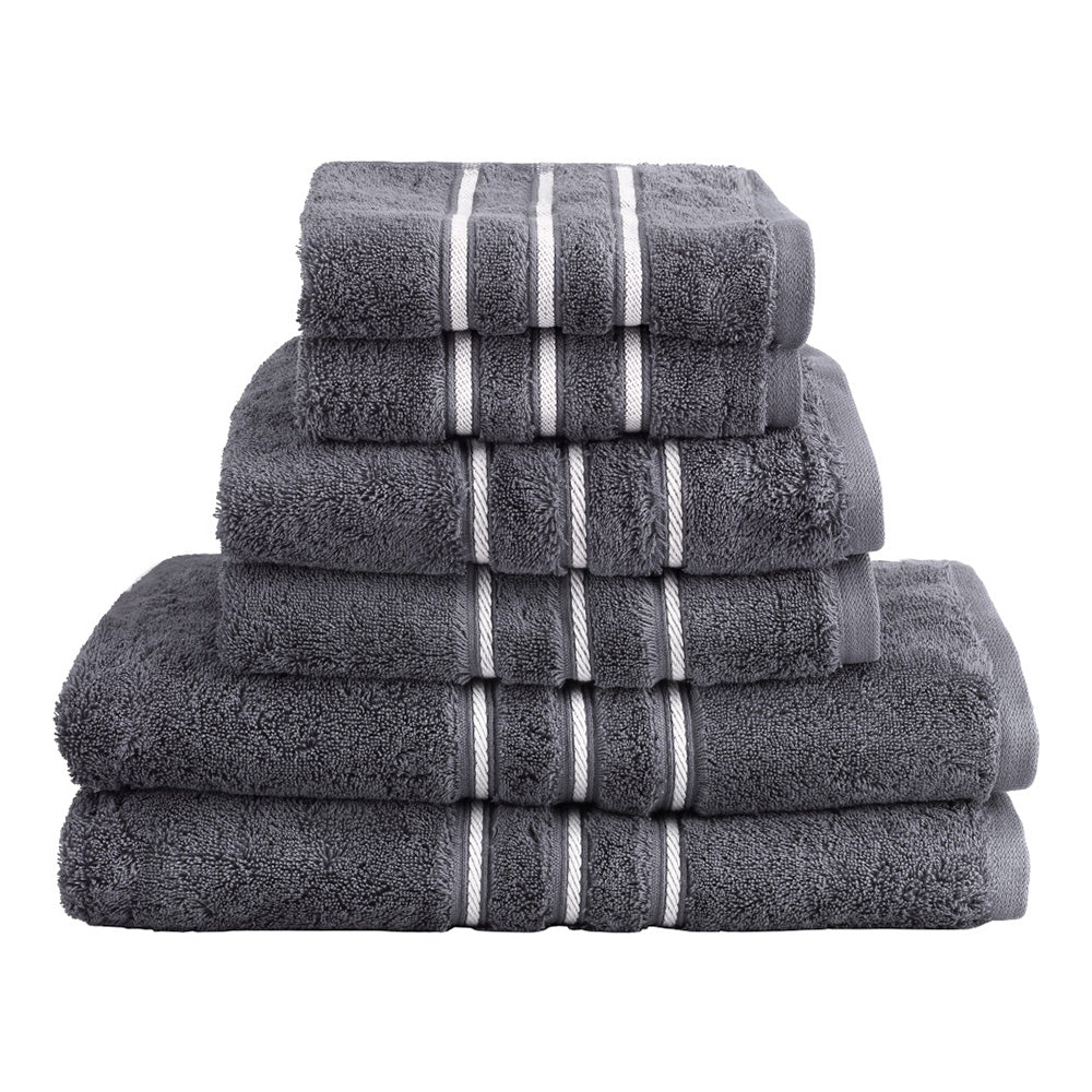 Stack of gray towels with white stripes on a white background